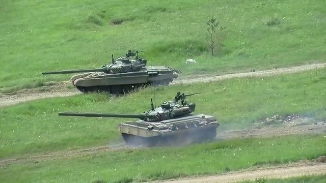 Propeller Plane Doing WW2 Style Close Air Support to Russian Tanks During 2015 NATO Exercise