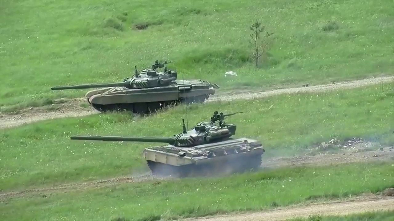 Propeller Plane Doing WW2 Style Close Air Support to Russian Tanks During 2015 NATO Exercise