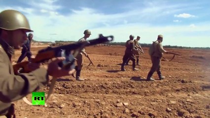 RAW: Impressive WWII battle reconstruction shot with drones & GoPros