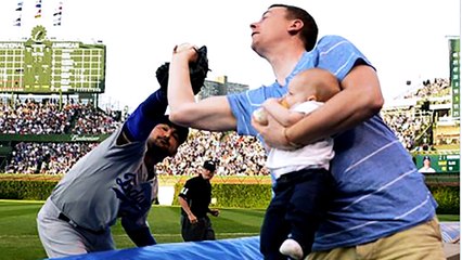 Fan Steals Foul Ball From Dodgers While Simultaneously Feeding a Baby