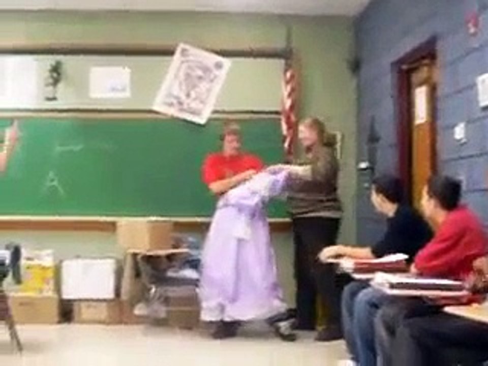 Boy Putting On Dress