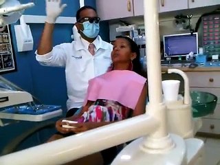 1425 a girl in a dentist office...