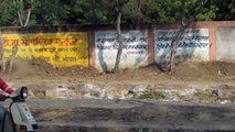 Protest murals on wall of abandoned Union Carbide factory, Bhopal