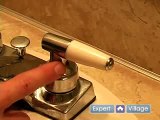 How to Fix a Faucet : How to Tighten a Bathroom Sink Handle