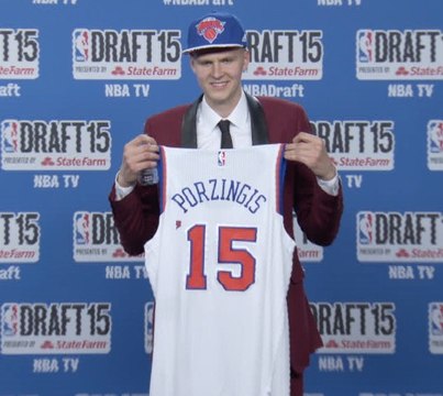 Knicks draft pick Kristaps Porzingis reacts to booing fans