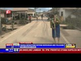 Warga Gotong Royong Bersihkan Abu Vulkanik Sinabung
