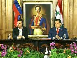 Presidente Chávez condecora a su homólogo sirio Bashar Al-Assad