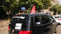 French taxi drivers block roads in strike against Uber