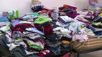 Sardinia's poor defy anti-immigrant mood, give all to refugees