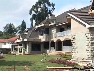 Bulldozers demolish posh houses