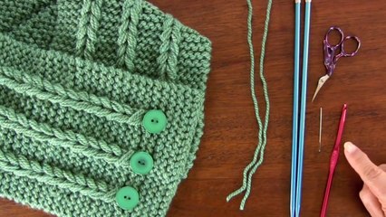 Cuello con trenzas de vainillas tejido en dos agujas