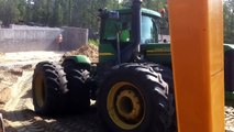 New Holland T9050 and John Deere 9530 tractors pulling pans