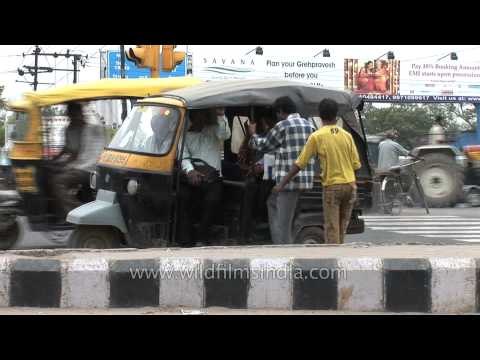 Passengers take lift from auto-rickshaw: Faridabad, Haryana
