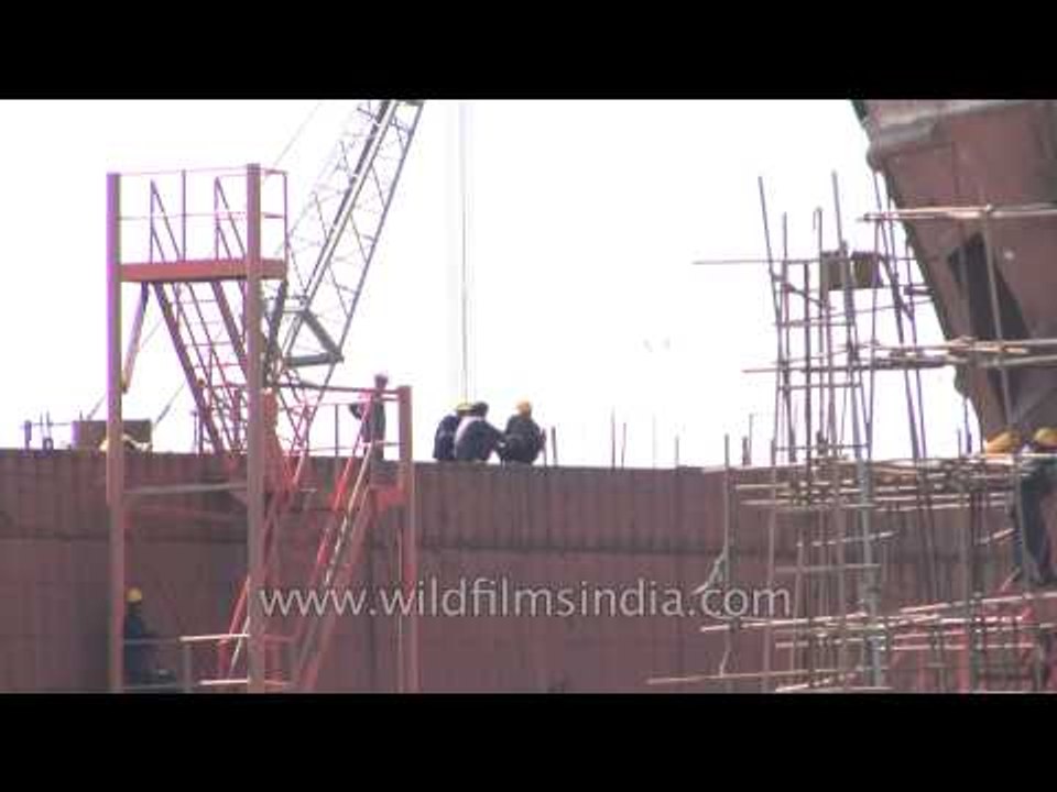 Indian workers construct ship at Alang, Gujarat