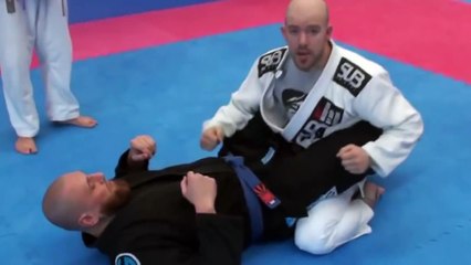 Karate instructor smacks student in the face and fight break out
