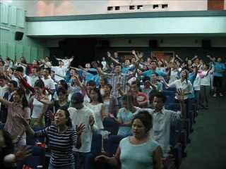 worshiping and praising