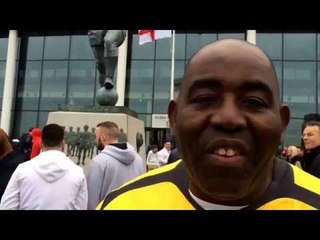Robbie at Wembley by the Bobby Moore Statue