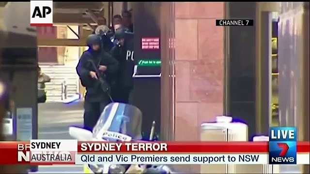 Hostages Seen Fleeing Australian Cafe