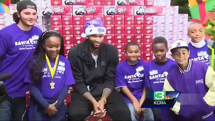 DeMarcus Cousins plays 'Santa Cuz' for the day at Sacramento Walmart