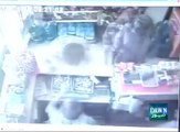 CCTV footage shows brave shopkeeper tackles robbers