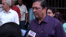 Justice Santosh Hegde campaining door-to-door for Dr. Ashwin Mahesh