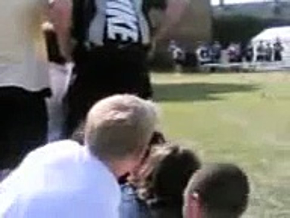 a fat boy falling over hurdles