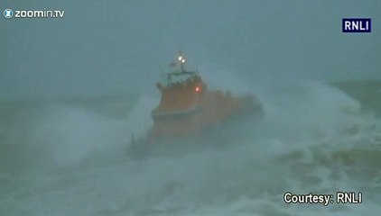 Boy swept off as hurricane-force storm hits Britain