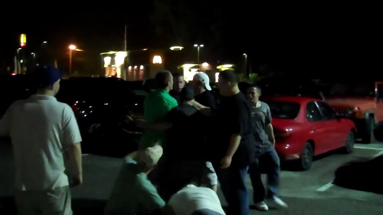 Fight outside the Bar.