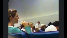 Girl Chewing on Pen