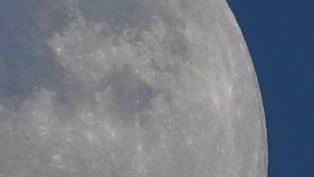 Camera's zoom let us see Moon moving! Optical Zoom World Record