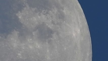 Camera's zoom let us see Moon moving! Optical Zoom World Record