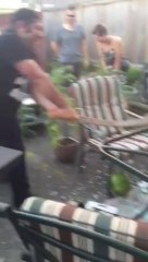 Guy cuts watermelon with sword... and the whole table!