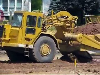 Living on the Edge -- CAT Earthmovers excavating a pond -- 7-22-11.wmv