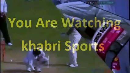 Very funny: Bishoo is hit with Umar Akmal's bat