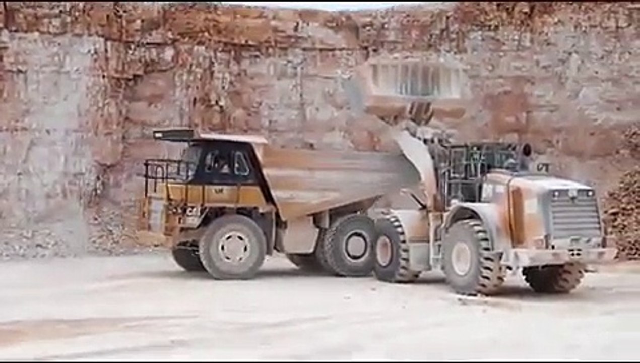 chargeuse Caterpillar 980K & Dumper Caterpillar 771D