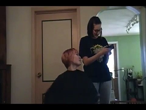 Pretty girl shaves her head for Charity