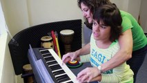 Mewsic Moves: Transforming Developmental Disabilities into Abilities through Music Therapy