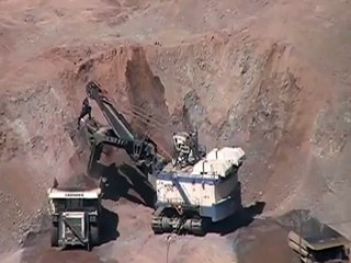 P&H 4100 XPB Electric Shovel Loading  Liebherr And Caterpillar Haul Trucks