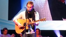 Billy Magnussen singing at ATWT event