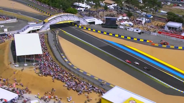 Aerial view of Audi #7 overtaking Porsche #17