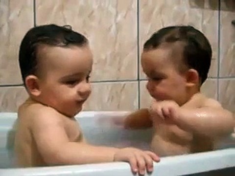 Twins Brothers Enjoying Bath Time