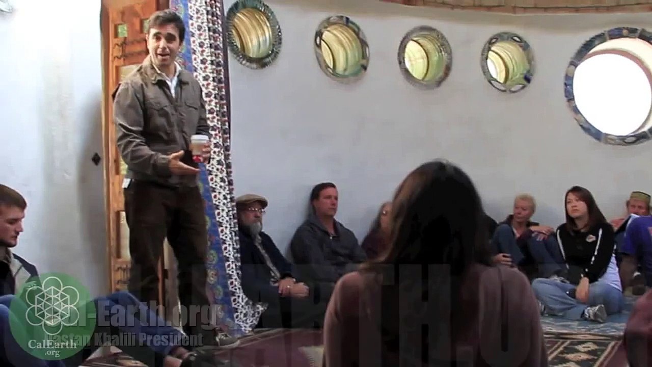 Dastan from Cal Earth Super Adobe green home building telling a story.