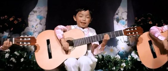The Interview - Scene where the children are playing the guitar