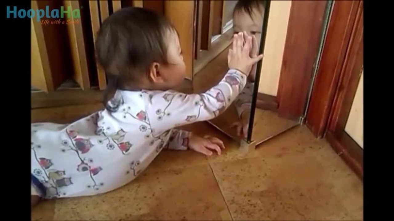 Babies' First Glance At Their Own Reflections