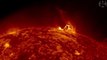 Huge arching eruption on sun's surface captured by Nasa – video