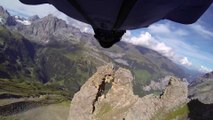 Best Wingsuit Flight ever through hole in the mountain