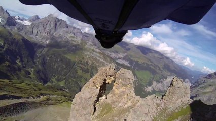 Best Wingsuit Flight ever through hole in the mountain
