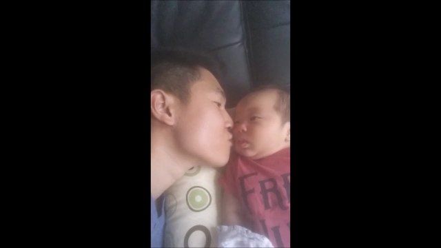 Baby vomits on dad while kissing him! Parents fail...