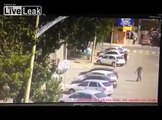 LiveLeak Daily - Idiot throwing rocks at car