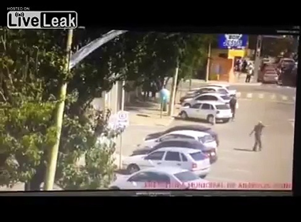 LiveLeak Daily - Idiot throwing rocks at car